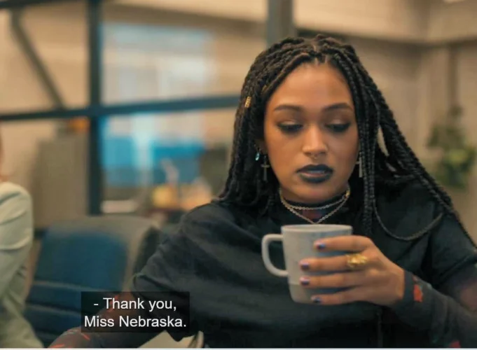 Savannah Basley as Zooey L'Enfant with coffee cup - SurrealEstate