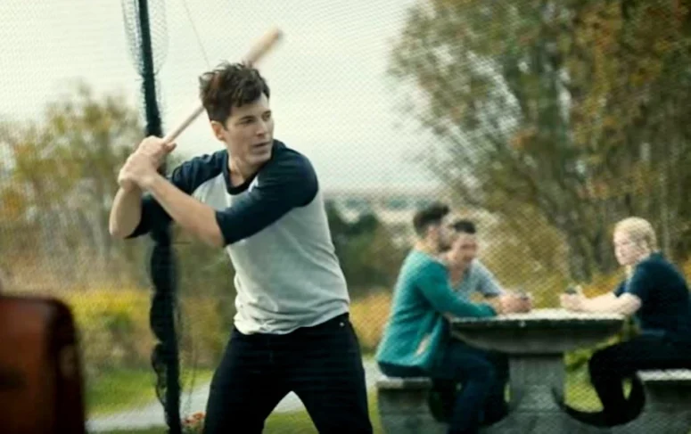Tim Rozon as Luke Roman in the batting cage - SurrealEstate