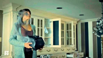 Megan (Tennille Read) and Augie's machine that draws the demon out - SurrealEstate 108