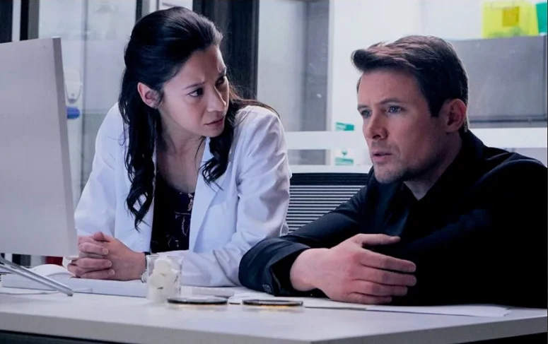 Mayko Nguyen as Chief of Forensics Sarah Truong and John Reardon as Detective Charlie Hudson on 'Hudson and Rex'