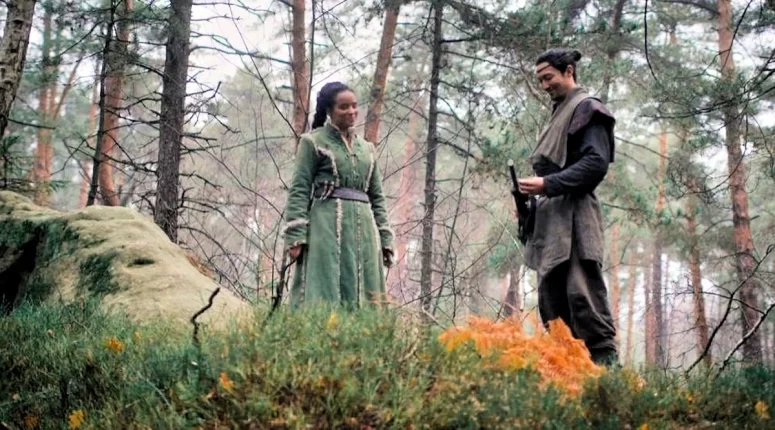 Zoe Rotins as Nynaeve and Daniel Henney as Lan - The Wheel of Time 104