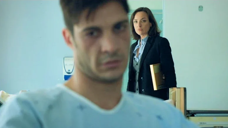 Clara, with a box of chocolates under her arm, checks on Pascal in the hospital to see how much he remembers - Premonitions