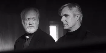 Father Graham (Nigel Bennett) eyes his predecessor Frederick (Henry Czerny) warily while dispensing priestly advice - The Righteous