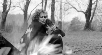 Ethel comforts Aaron, and seems to be protecting him from the fire.