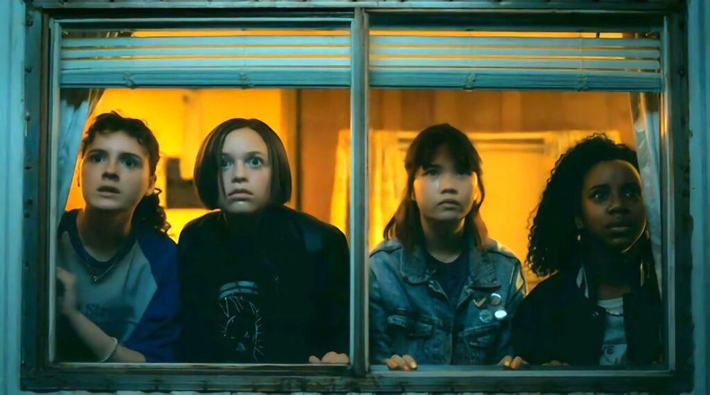 The Paper Girls watch the battle of machines in episode 105