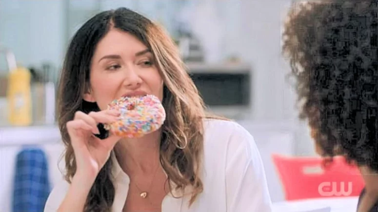 Abigail (Jewel Staite) emphatically eating a doughnut - Family Law 101