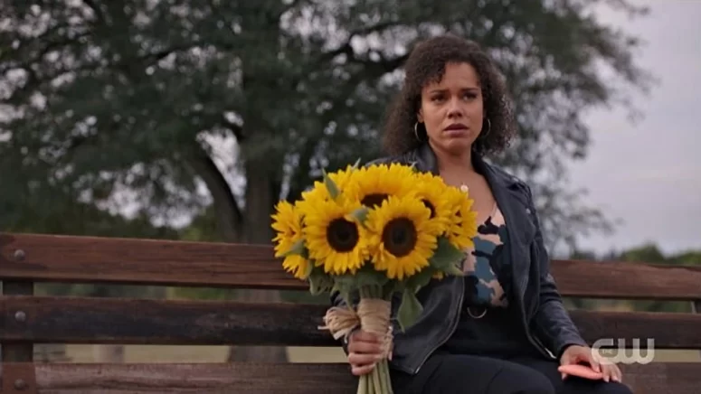 Genelle Williams with sunflowers - Family Law