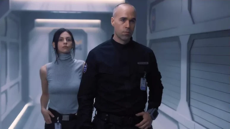 Head of Security Felix Strickland (Palve Jerinic) and his unnamed assistant. - The Ark 102