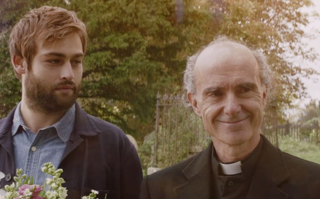 Douglas Booth as Jamie and Finbar Lynch as Father Brendan - Unwelcome