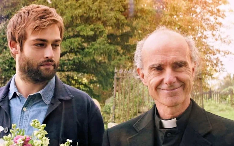 Douglas Booth as Jamie and Finbar Lynch as Father Brendan - Unwelcome