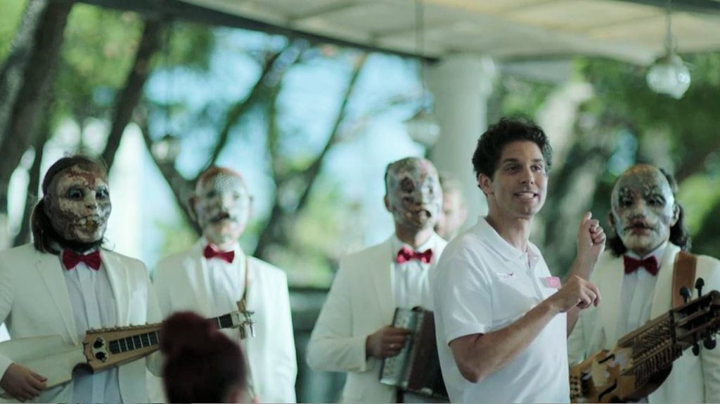 Adam Boncz as Ketch with the waiters - Infinity Pool