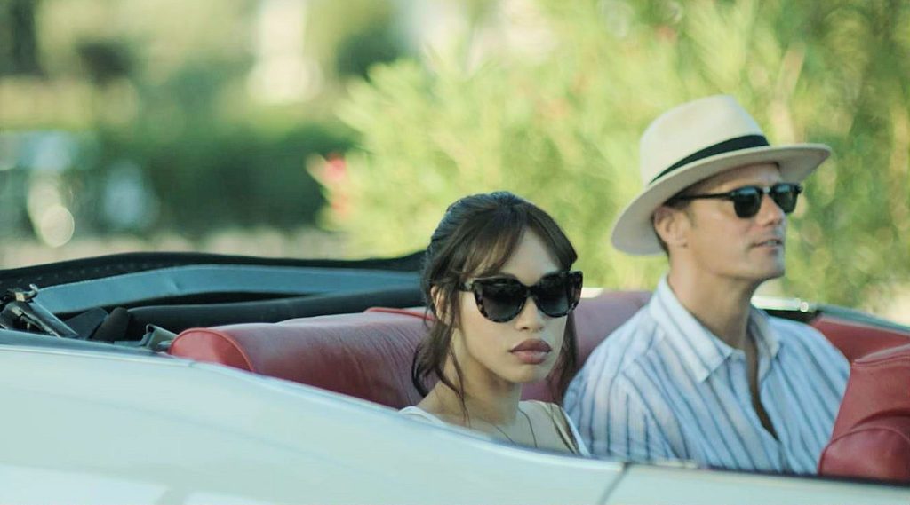 Cleopatra Coleman as Em and Alexander Skarsgard as James - Infinity Pool