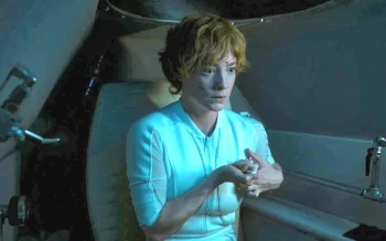 Leonie Benesch as Charlie Wagner giving herself an injection of alien life - The Swarm