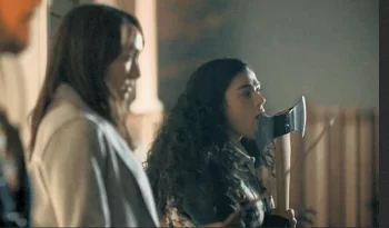 Reine Faiad licks the axe before going into battle - SurrealEstate - 206