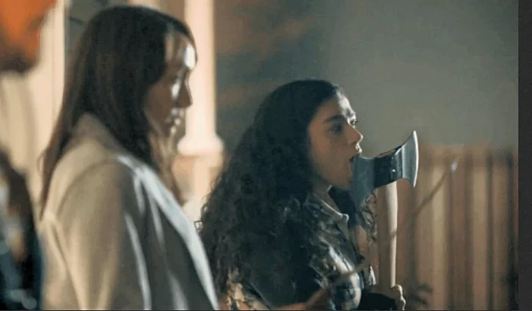 Reine Faiad licks the axe before going into battle - SurrealEstate - 206