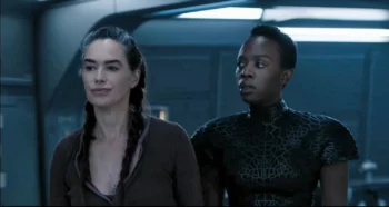 Lena Heady as Aster and Natasha Mumba as Harmony having a personal moment on the stairs - Beacon 23