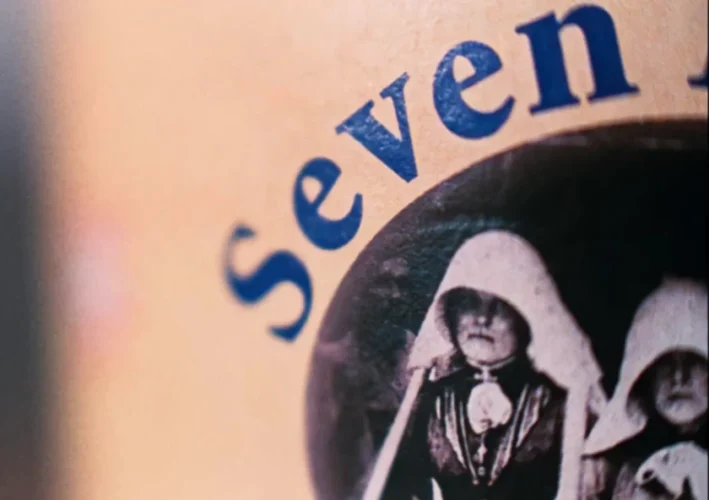 Maids with beards pictured on the milk box - Enys Men