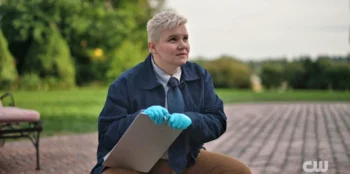 Pathologist Robin (Emily Nimetz) wearing a tie - Wild Cards