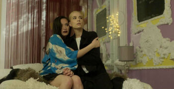 Hazel (Cara Gee) clings to Sheila (Kathleen Munroe) for protection - Birdland