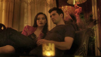 Tom (David Alpay) and Hazel (Cara Gee) together on a couch - Birdland