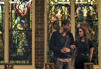 Emma and Adam with stained glass - A Sunday Kind of Love