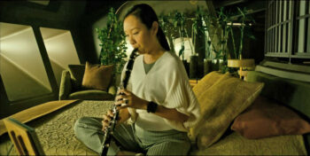 Ellen Wong as Iris, with her clarinet - Beacon 23