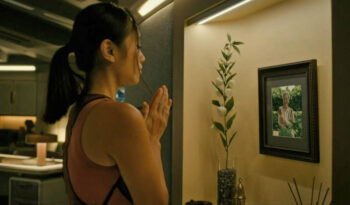 Ellen Wong as Iris at her grandmother's shrine - Beacon 23