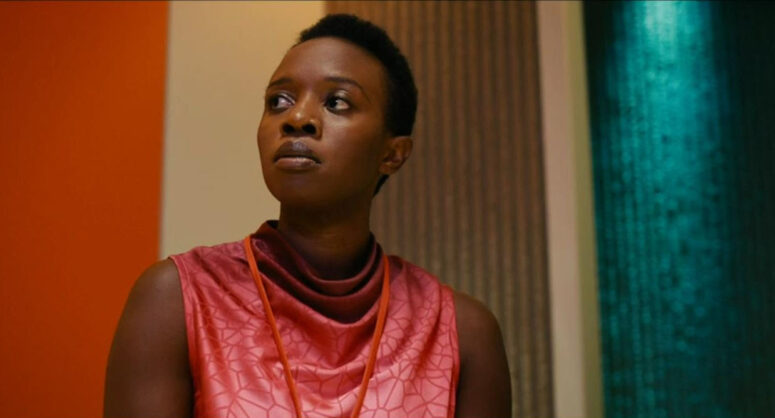 Natasha Mumba as Harmony in virtual reality and a red dress - Beacon 23