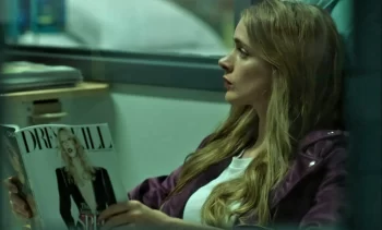 Chelsea (Hanneke Talbot) reads the Canadian fashion magazine 'Dress To Kill' - Rabid (2019)
