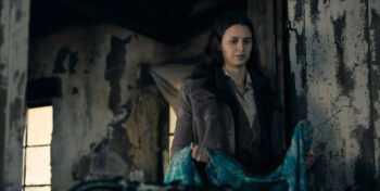 Sara (Avery Konrad) brings Tien Chien Liu's favourite dress for her to be buried in. - From 302