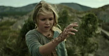 The bees alight on Isla (Alix West Lefler), but do not sting - The King Tide