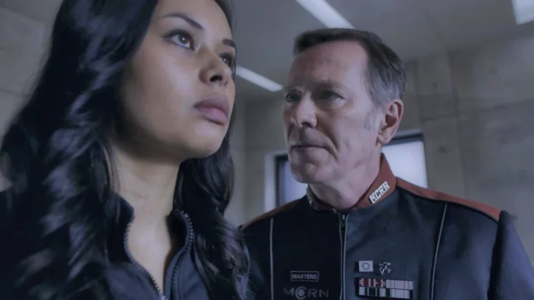 Peter Outerbridge as Captain Martens and Frankie Adams as Bobbie Draper in The Expanse