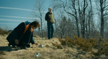 Scott McCord as Victor and Robert Joy as his father at the graves of Miranda and Eloise