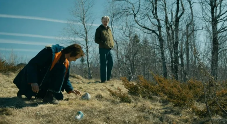 Scott McCord as Victor and Robert Joy as his father at the graves of Miranda and Eloise
