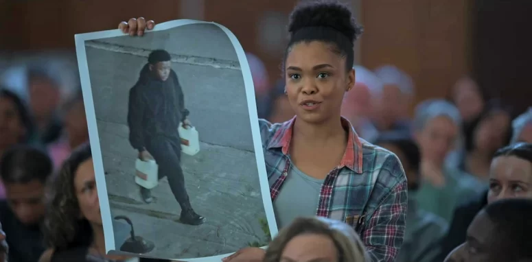 Kylie Fisher as Jesse September presenting evidence at a town meeting - Recipes for Love and Murder 204