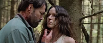 Tim Rozon and Emily Alatalo in Hunting Grounds