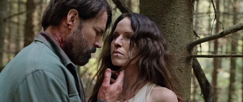 Tim Rozon and Emily Alatalo in Hunting Grounds
