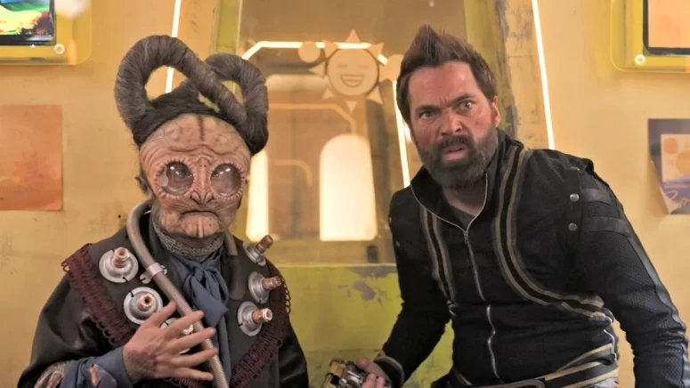 Isaac (Tim Rozon) on the Sunshine Express with a mysterious scientist (Megan Furniss) - Vegan Queen