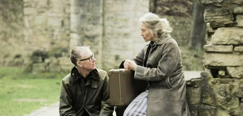 Peter (Vincent Gale) speaks to the spirit of his grandmother Oma (Inga Ross Kammerer) - Field Sketches