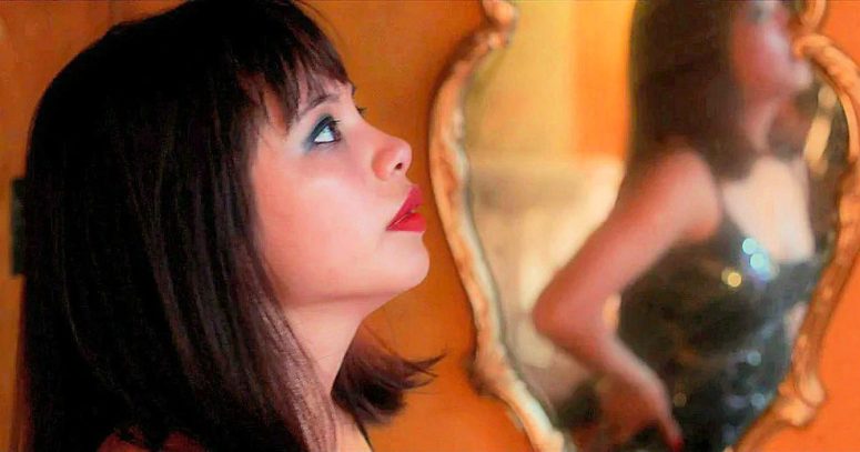 Gillian Nguyen as April - Loveland