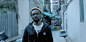 Rhamsy as the Zambian man's brother - Loveland