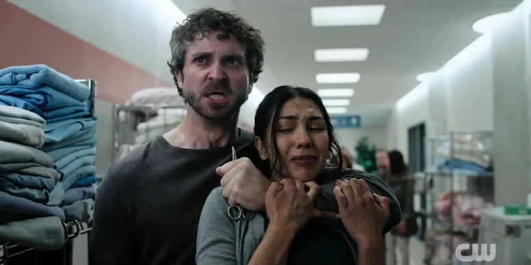 Darren (Harrison MacDonald) takes a nurse (Gigi Gill) hostage - Wild Cards 303