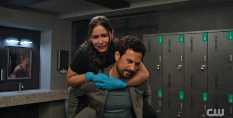 Manuela Sosa as Coroner Olive and Giacomo Gianniotti as Detective Cole Ellis - Wild Cards 304