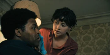 Kristi (Chloe Van Landschoot) prepares to treat Elgin's injuries - From 401