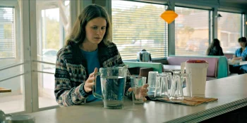 Sara (Avery Konrad) contemplates the conumdrum of the pitcher and the glass - From 404