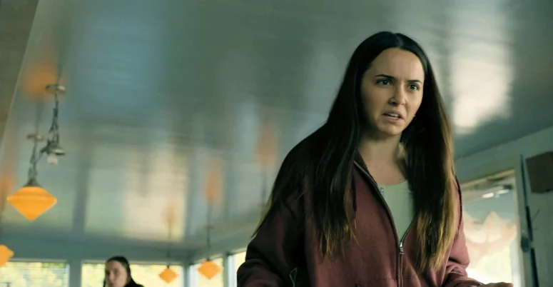 Julie (Hannah Cheramy) is angered by the suggestion that her arrival in the town might have been the cause of recent misfortune - From 403
