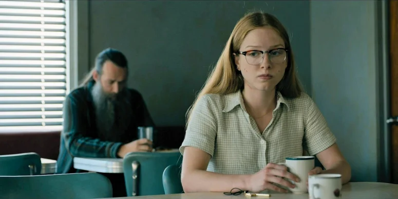 Sophia (Julia Doyle) at the diner after the funeral - From 403