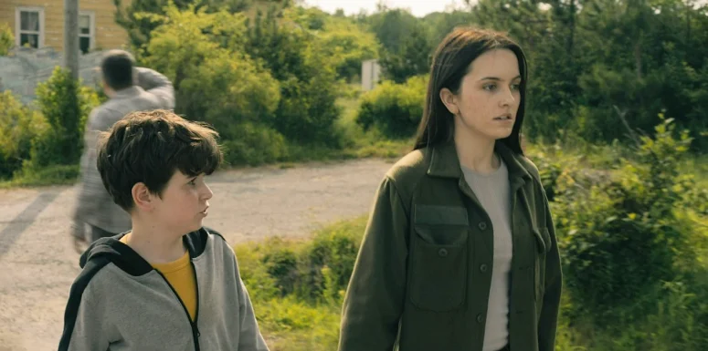 Ethan (Simon Webster) and his sister Julie (Hannah Cheramy) walk to the barn - From 402