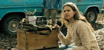 Sara (Avery Konrad) sets up the communication equipment as Jade and Tabitha enter the tunnels - From 409