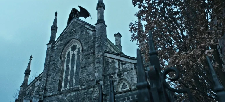 Father Roslovic's church, with a gargoyle on top that perhaps only certain people can see. - The Voices of Our Mother